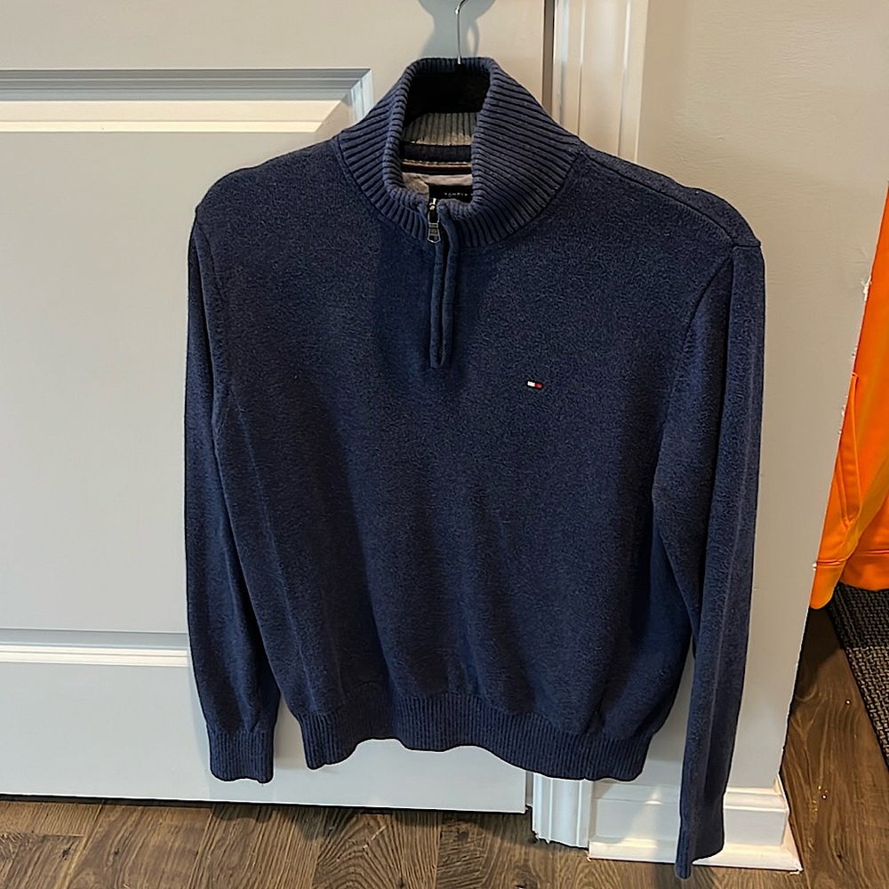 Two Tommy Hilfiger sweaters. Both men size medium. Light wear no stains.